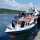 ein Hotel-Boot holt uns ab