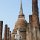 Tempel mit 'schreitender Buddha-Figur'