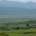 Hochland-Landschaft mit Massai-Dorf
